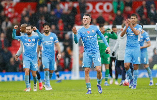 Manchester City celebrate their 2-0 win against Manchester United  in the Premier League 