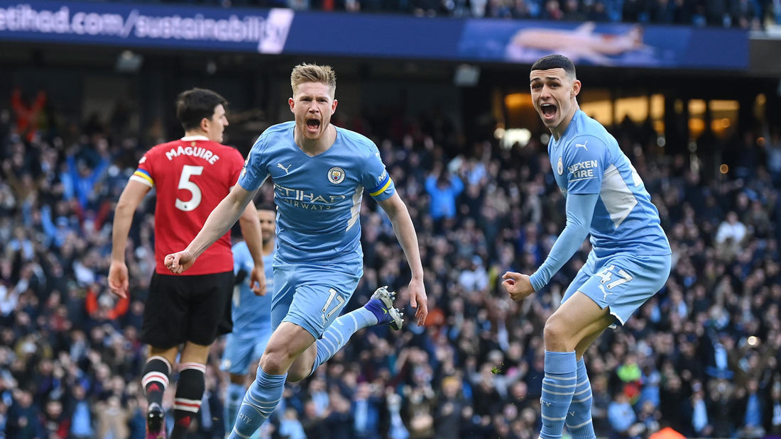 De Bruyne celebrating his goal with Phil Foden against Manchester United in the Premier League