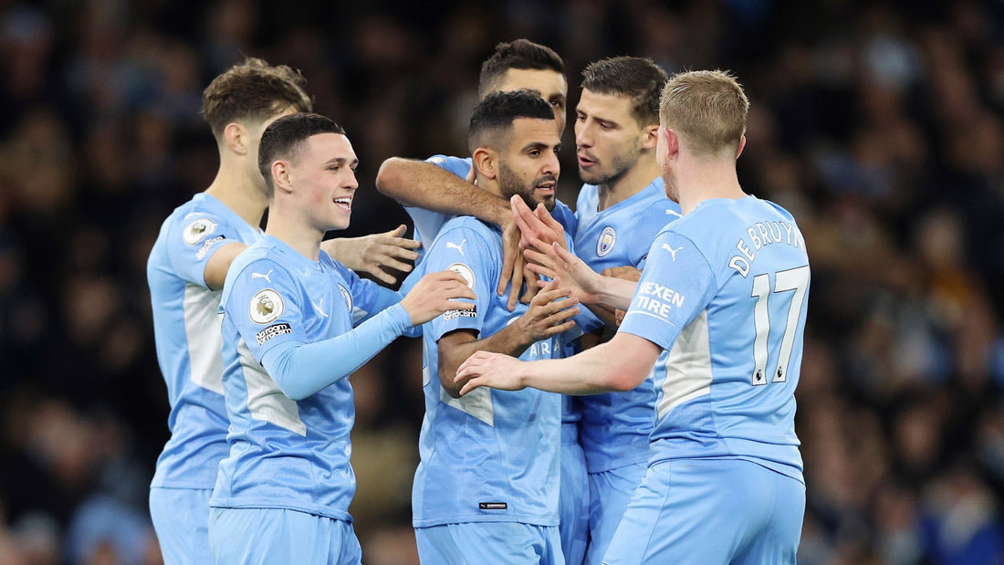 Manchester City celebrate their 7-0 win against Leeds